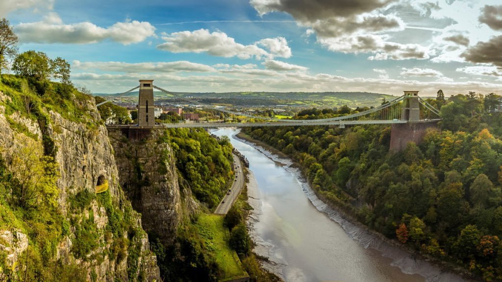 Family Holiday Chauffeur Services: Travel Made Easy With Croosr 3 Panoramic View Of The Avon Gorge With Clifton Suspension Bridge, Clifton Observatory, And The Giant'S Cave Viewpoint On A Bright Autumn Day In Bristol.